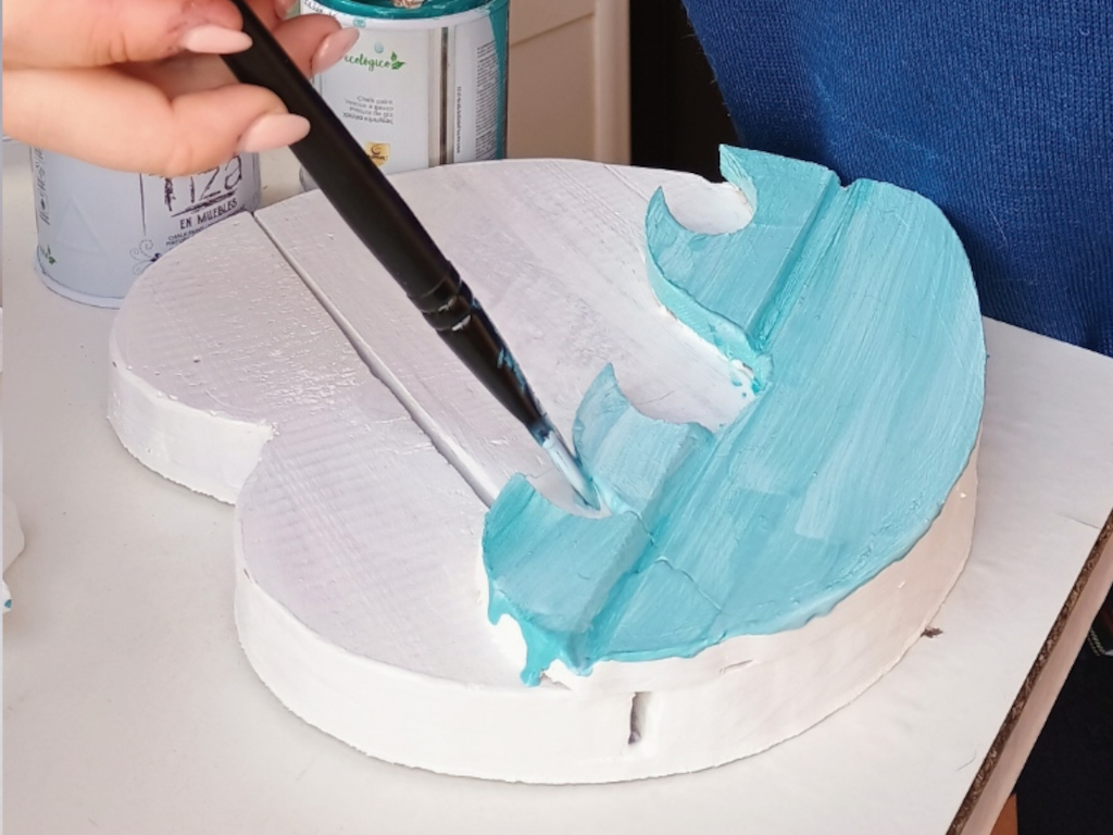 Handcrafted driftwood heart art with layered waves by Sun Kissed Crafts.