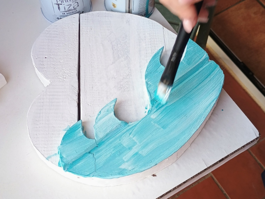 Handcrafted driftwood heart art with layered waves by Sun Kissed Crafts.